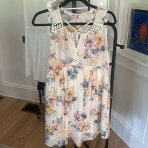 Flowy short length floral sundress.